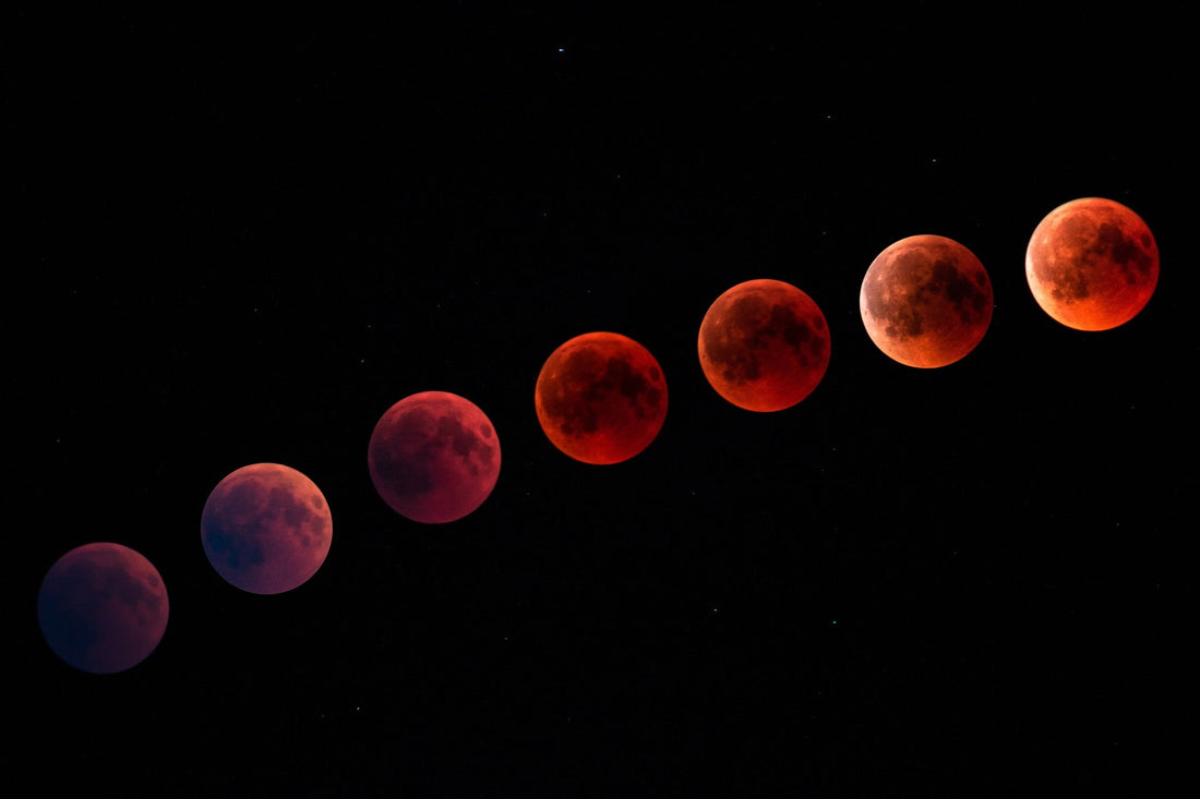 A blood moon over a witch's working space